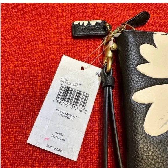 Coach Black Wristlet with White Daisy Design - Picture 5 of 6